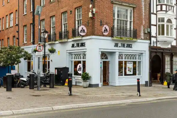 Corner view of Joe & The Juice Windsor showing restored shopfront and external signage