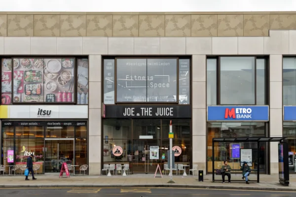 New Joe & The Juice shopfront and signage at Wimbledon Bridge House on Hartfield Road, Wimbledon